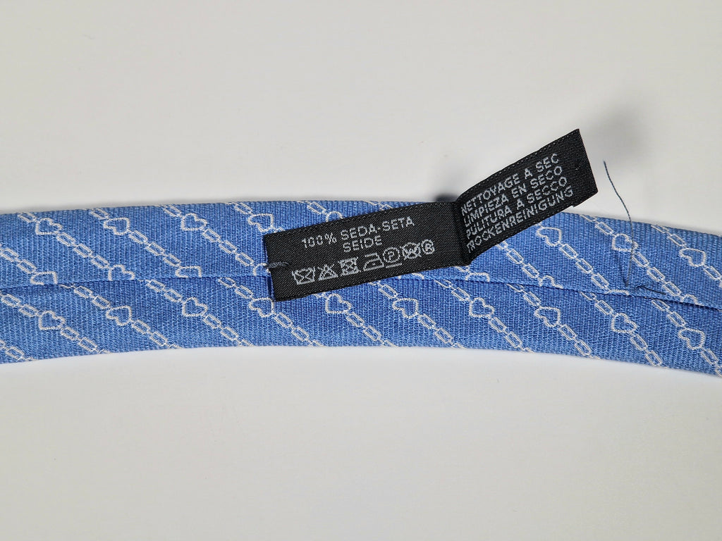 Hermès silk tie blue chain and hearts pattern 339360 T