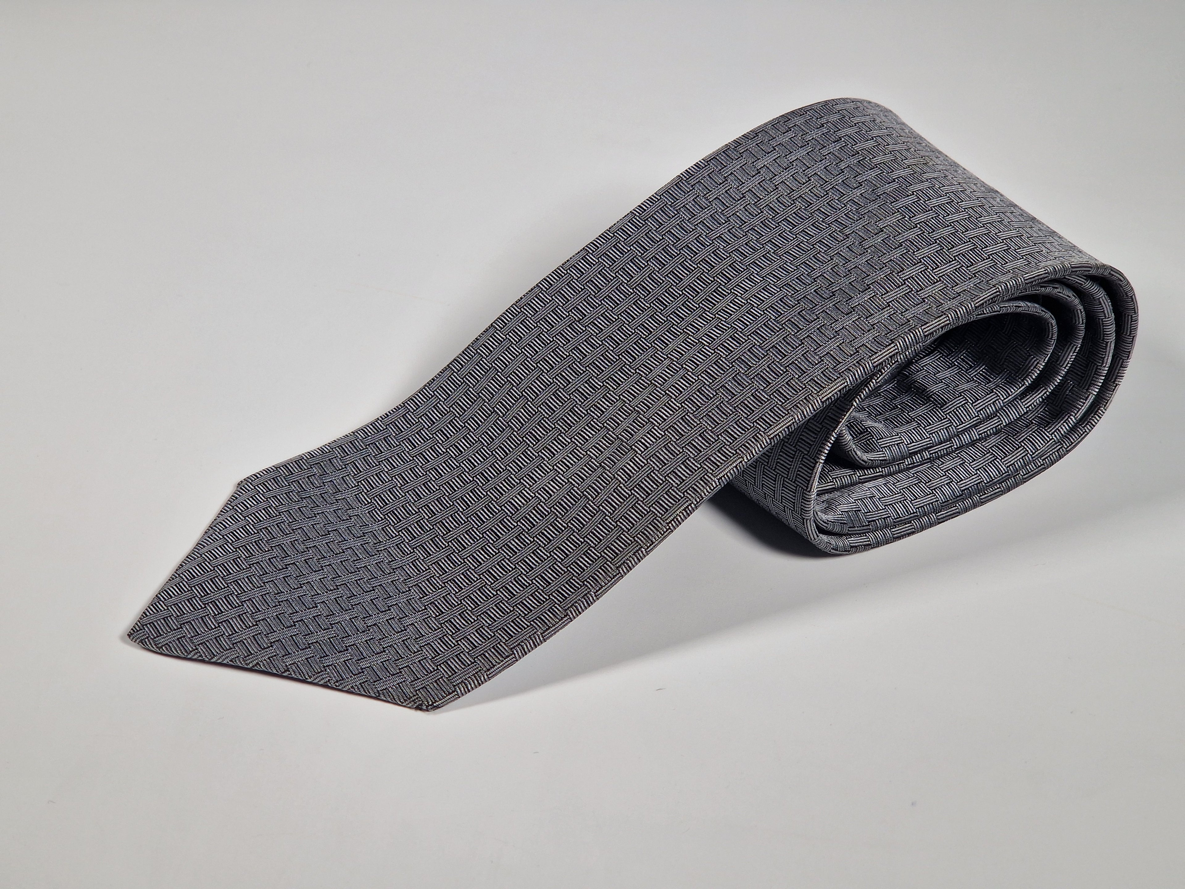 Hermès jaquard silk tie grey  H pattern and cow 428822 T
