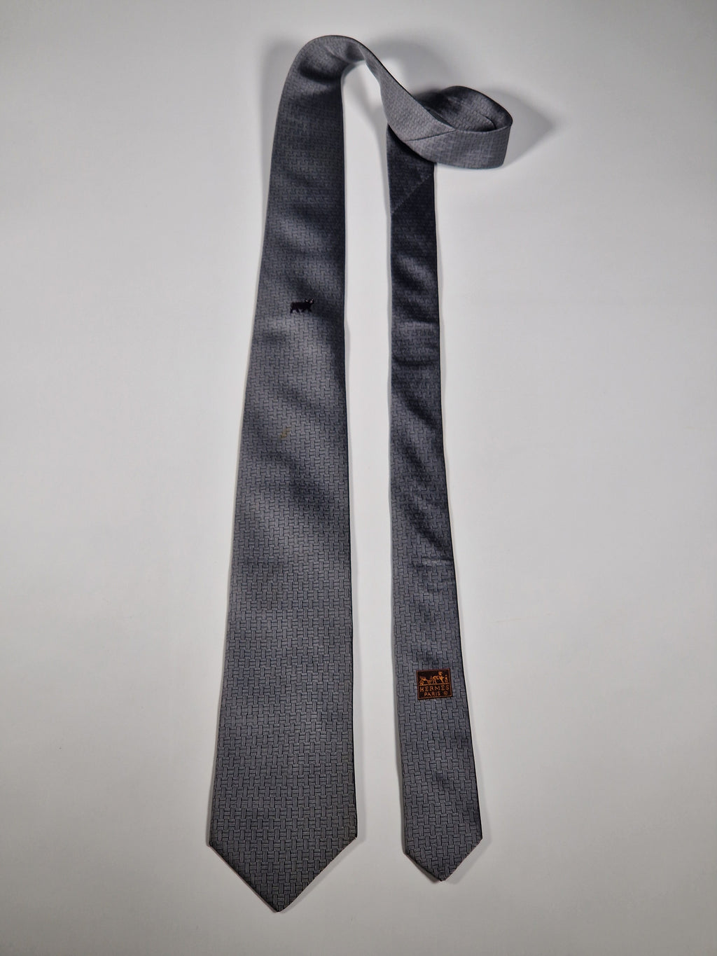 Hermès jaquard silk tie grey  H pattern and cow 428822 T