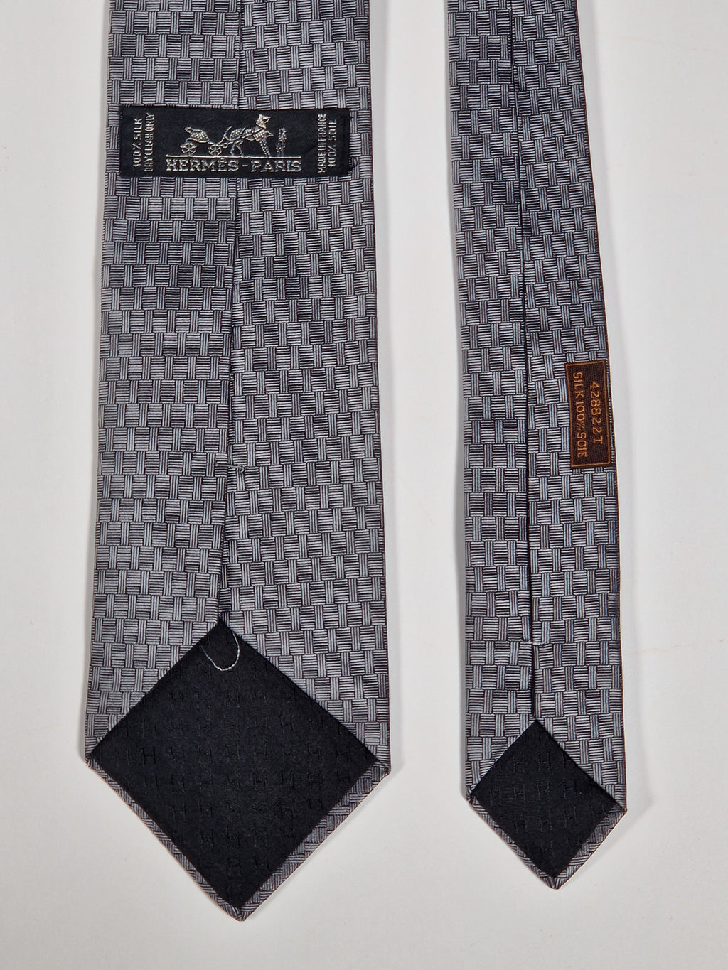 Hermès jaquard silk tie grey  H pattern and cow 428822 T
