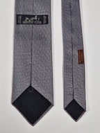 Hermès jaquard silk tie grey  H pattern and cow 428822 T