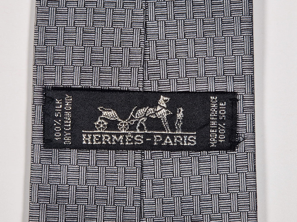 Hermès jaquard silk tie grey  H pattern and cow 428822 T