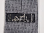Hermès jaquard silk tie grey  H pattern and cow 428822 T