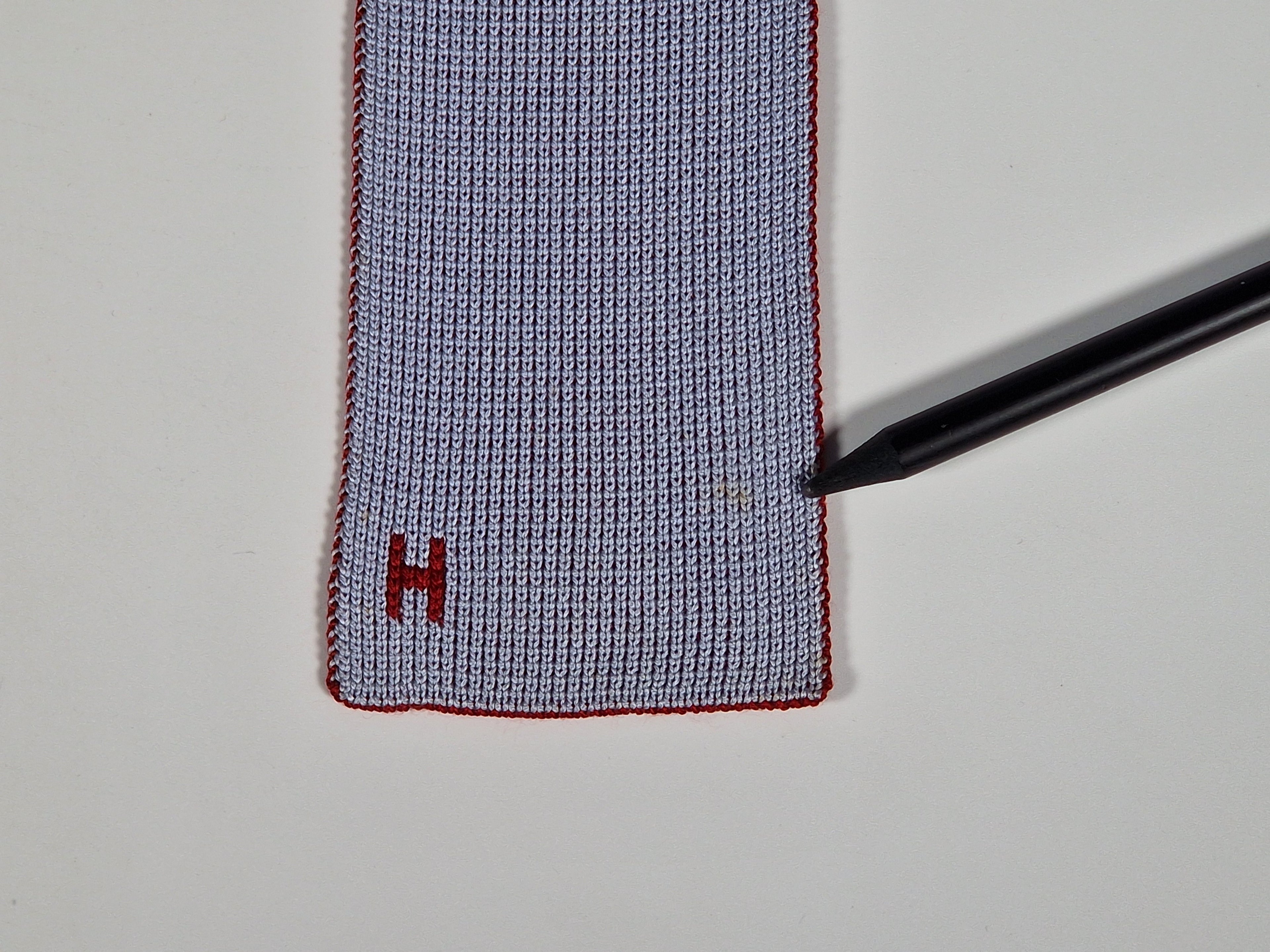 Hermés 4 way knit tie black blue red grey