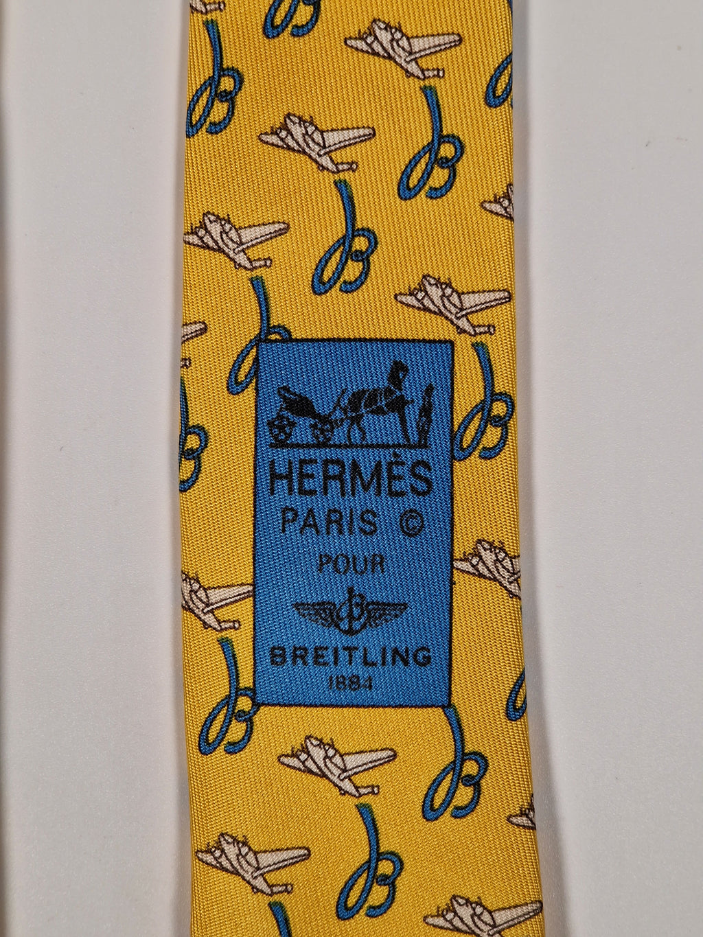 Hermès silk tie yellow Breitling pattern 5021 EA