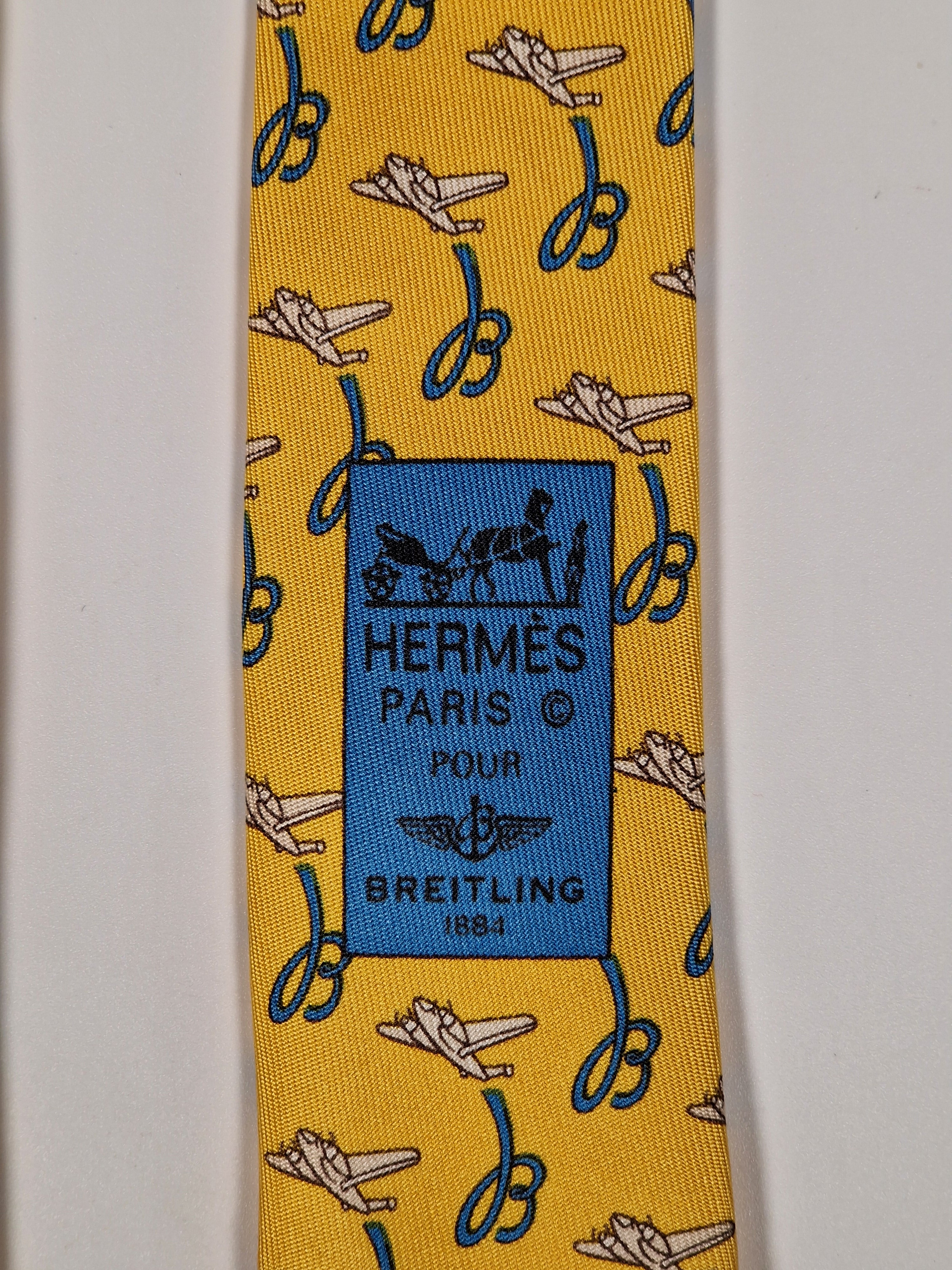 Hermès silk tie yellow Breitling pattern 5021 EA