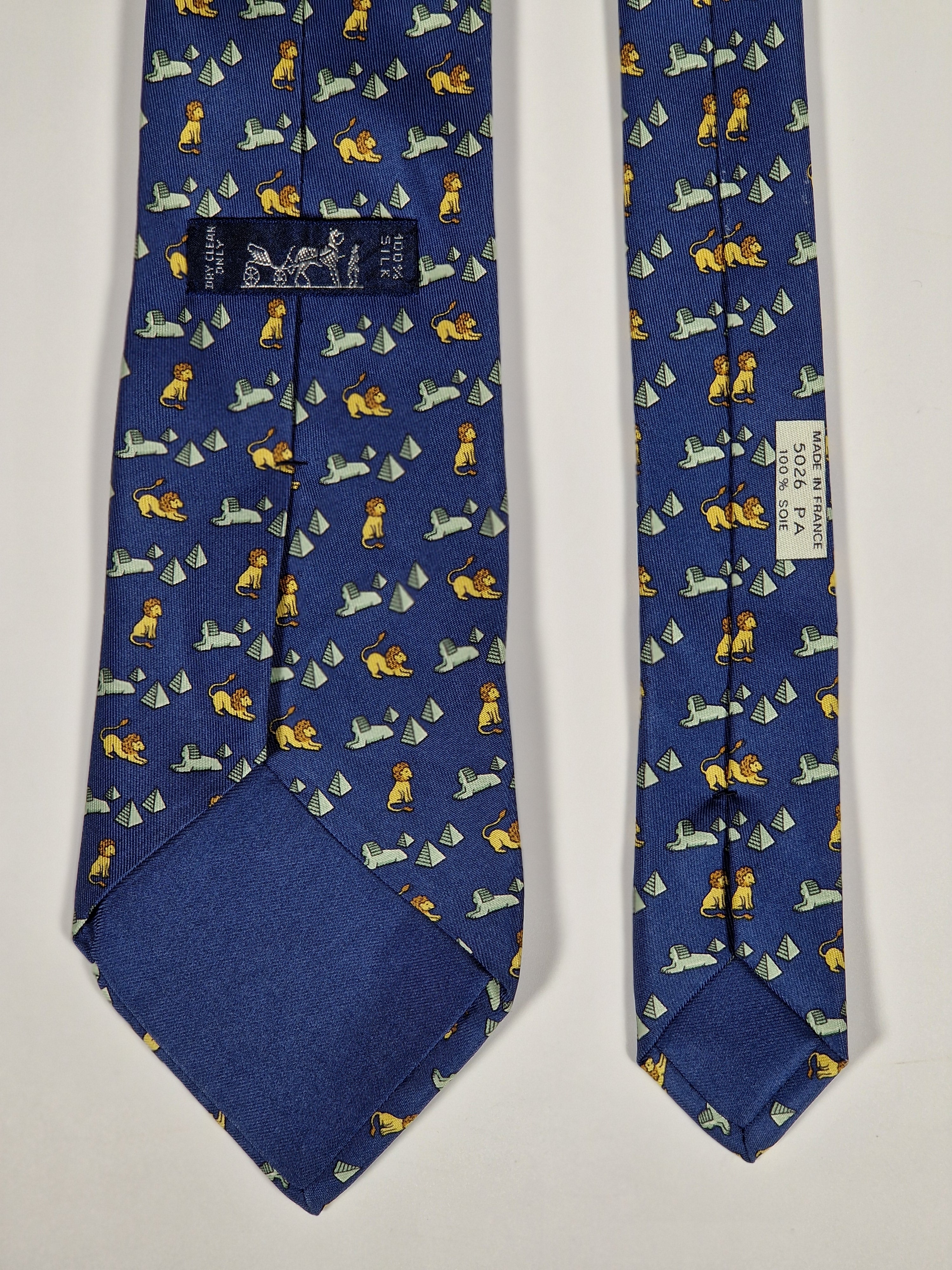 Hermès silk tie blue Lion and spinx pyramide pattern 5026 PA
