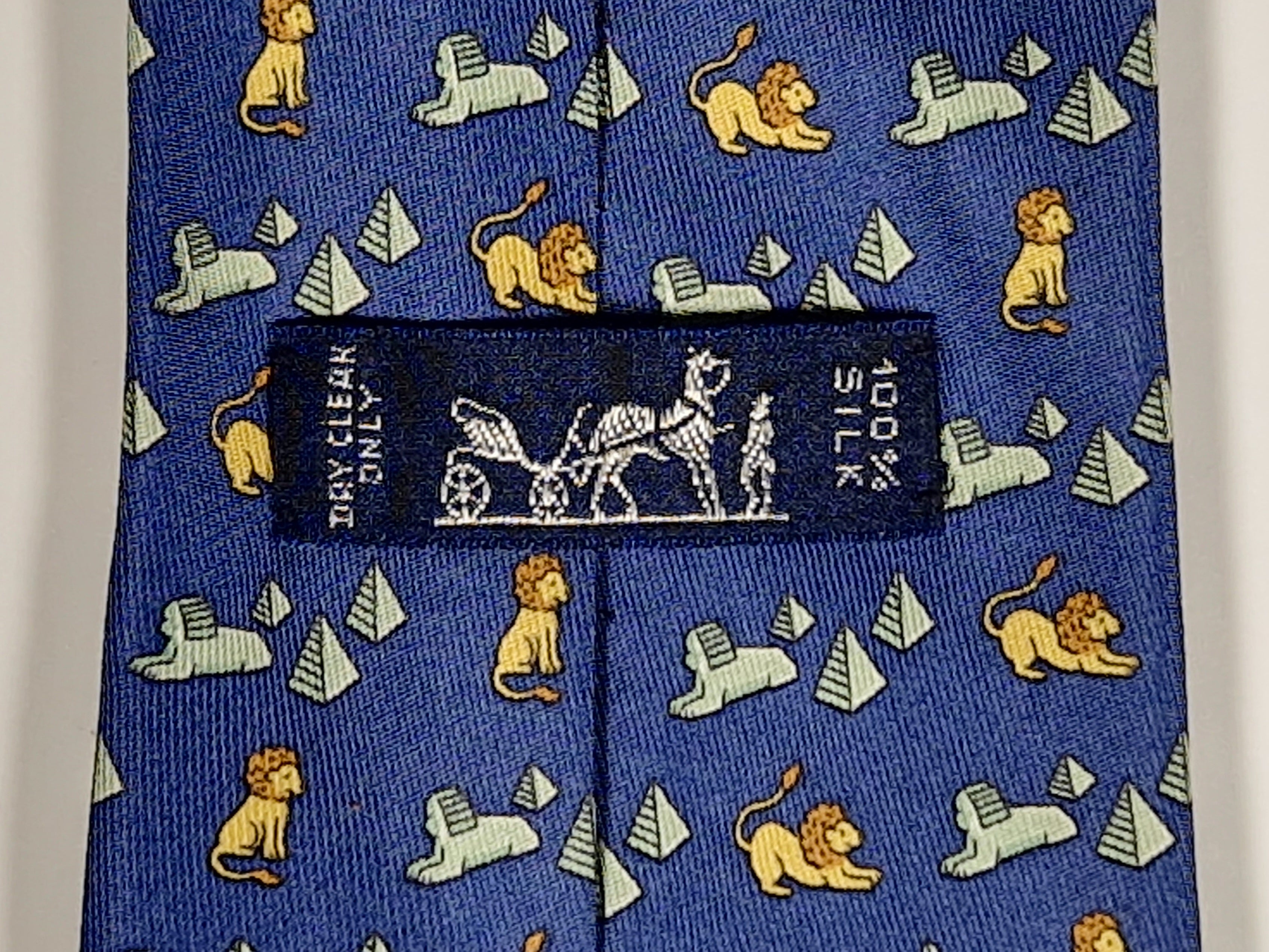 Hermès silk tie blue Lion and spinx pyramide pattern 5026 PA