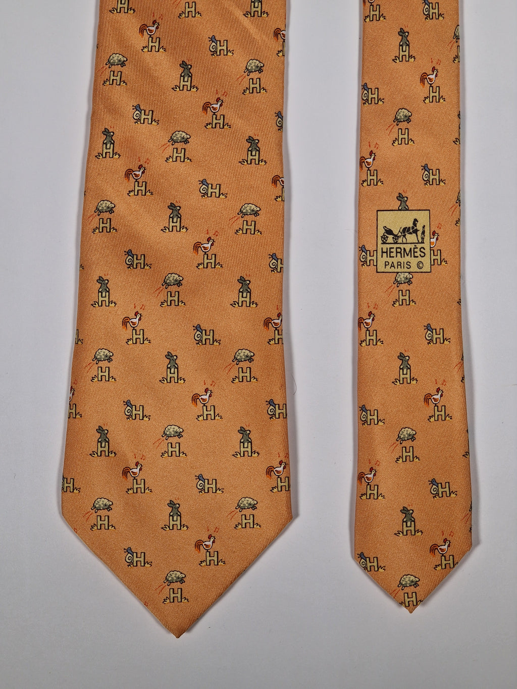 Hermès silk tie orange Animals and H pattern whimsical 5029 FA