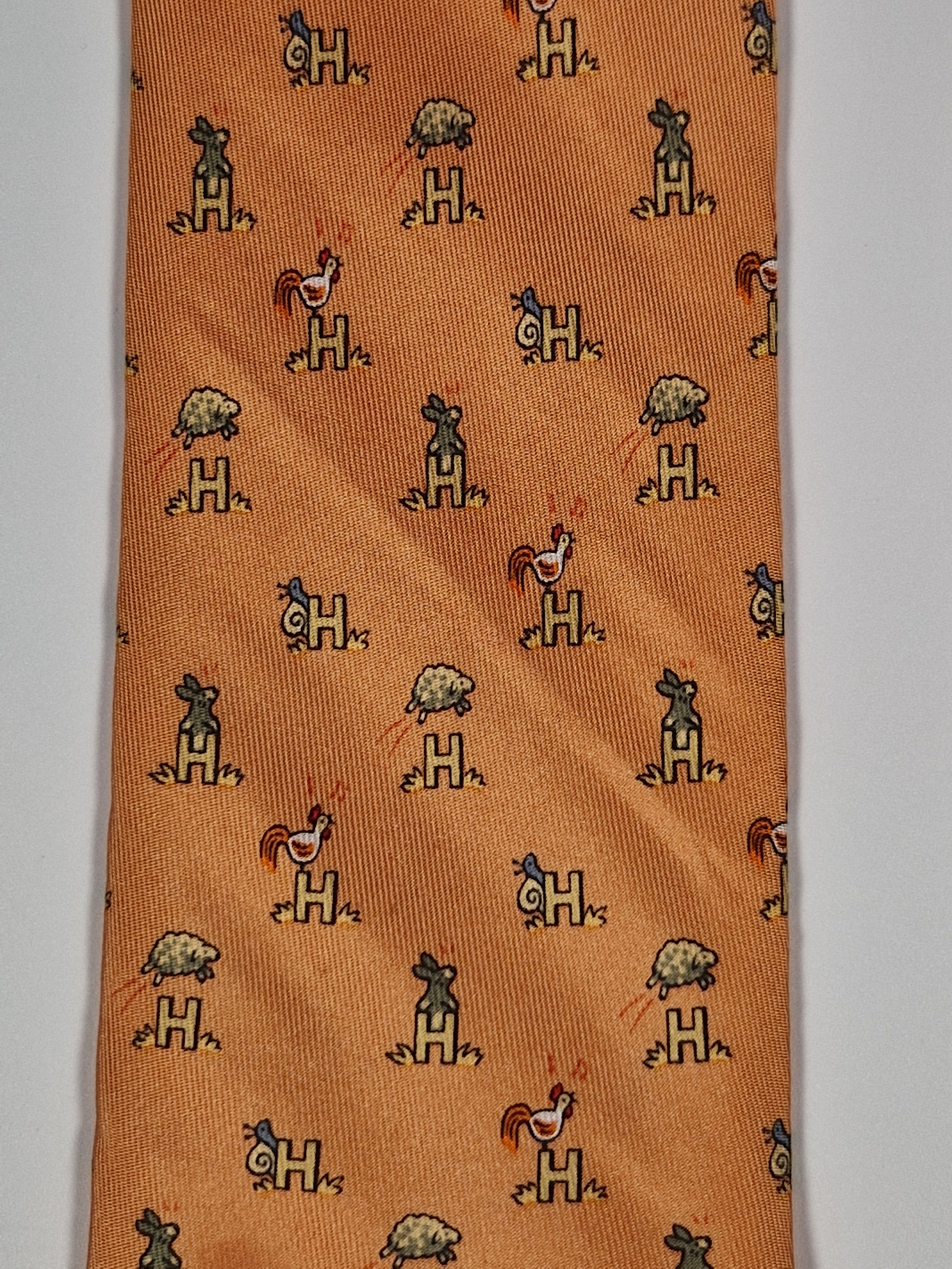Hermès silk tie orange Animals and H pattern whimsical 5029 FA