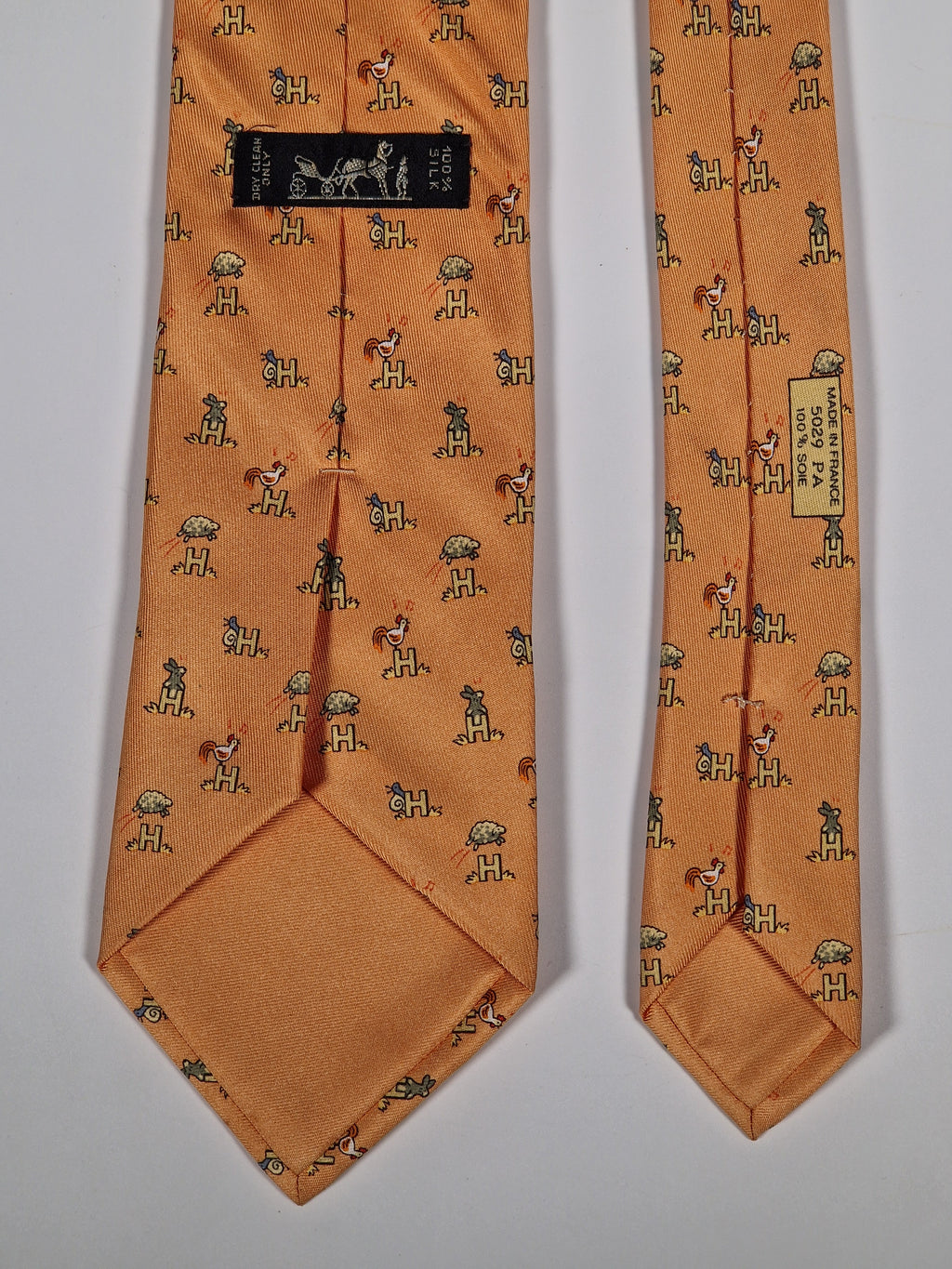 Hermès silk tie orange Animals and H pattern whimsical 5029 FA