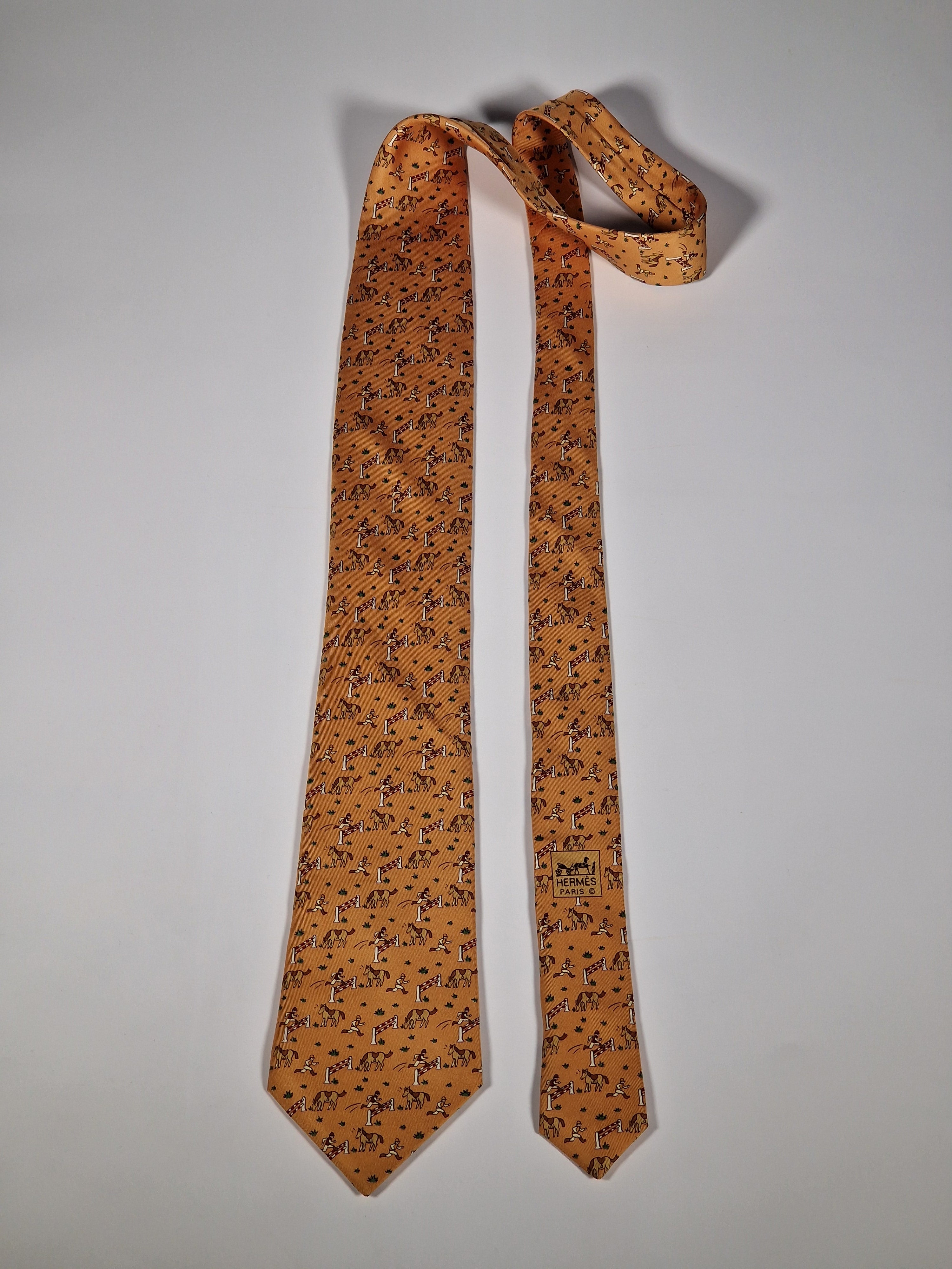 Hermès silk tie orange whimsical equestrian pattern 5042 PA