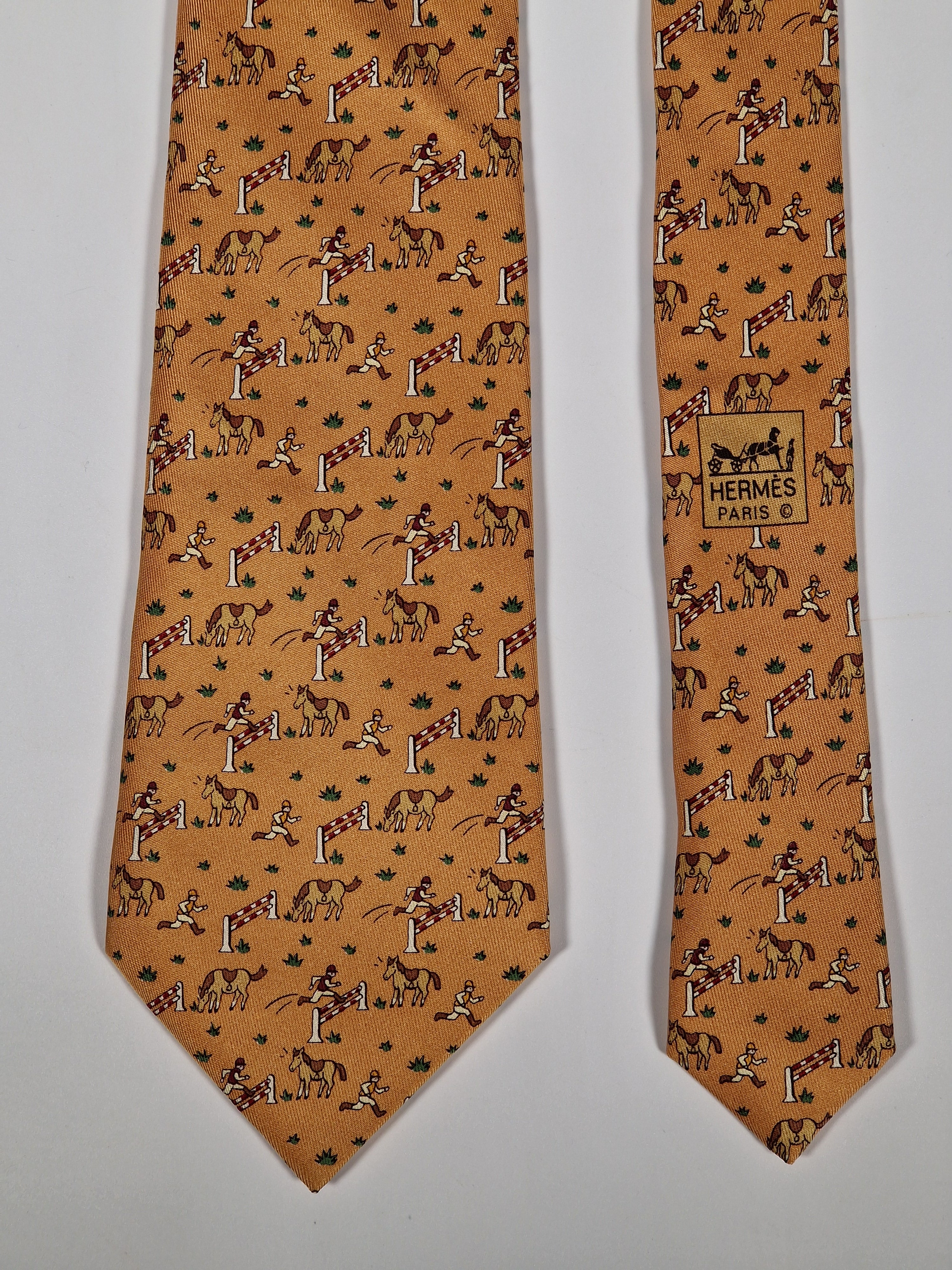 Hermès silk tie orange whimsical equestrian pattern 5042 PA