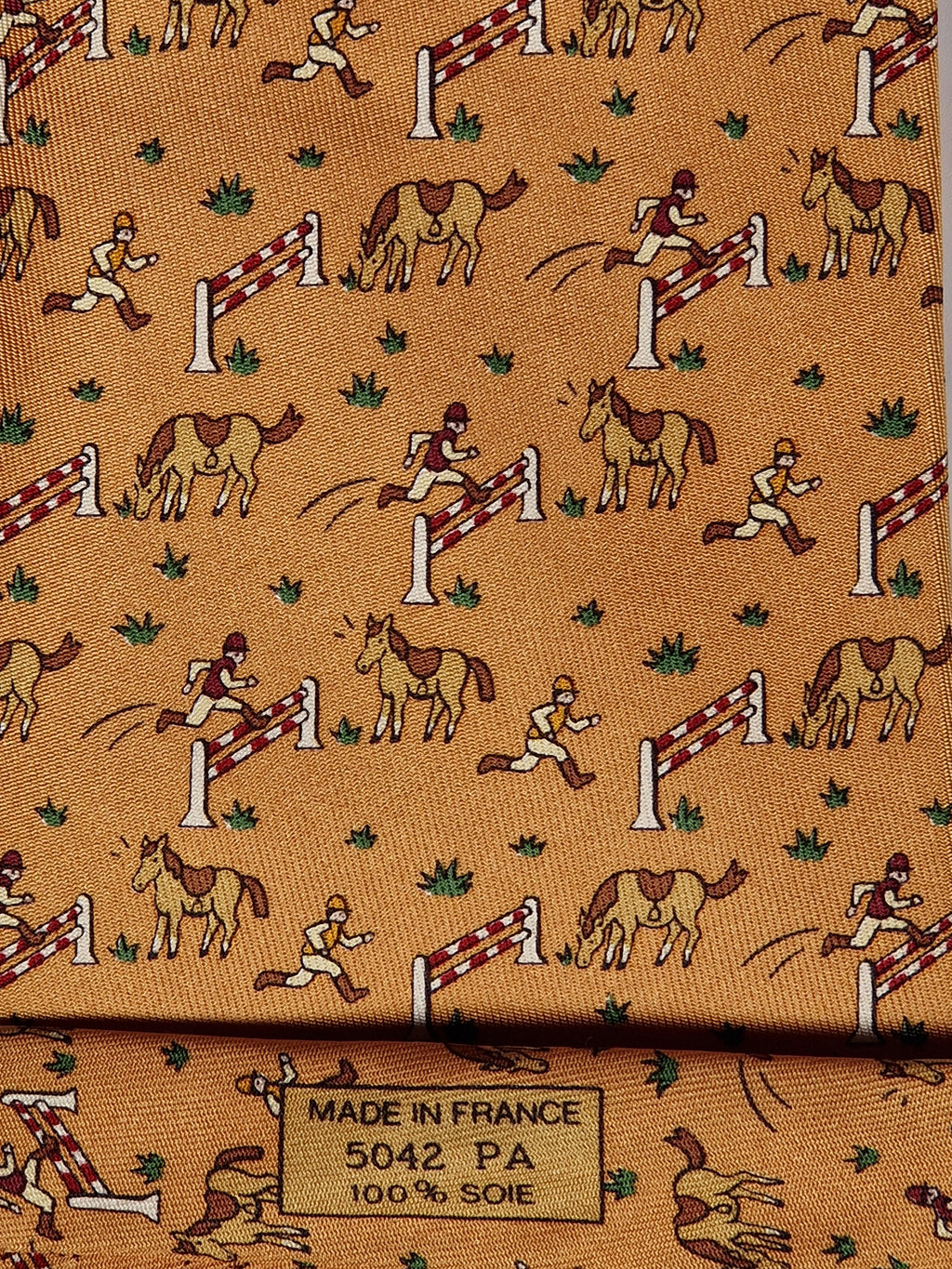 Hermès silk tie orange whimsical equestrian pattern 5042 PA
