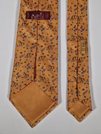 Hermès silk tie orange whimsical equestrian pattern 5042 PA