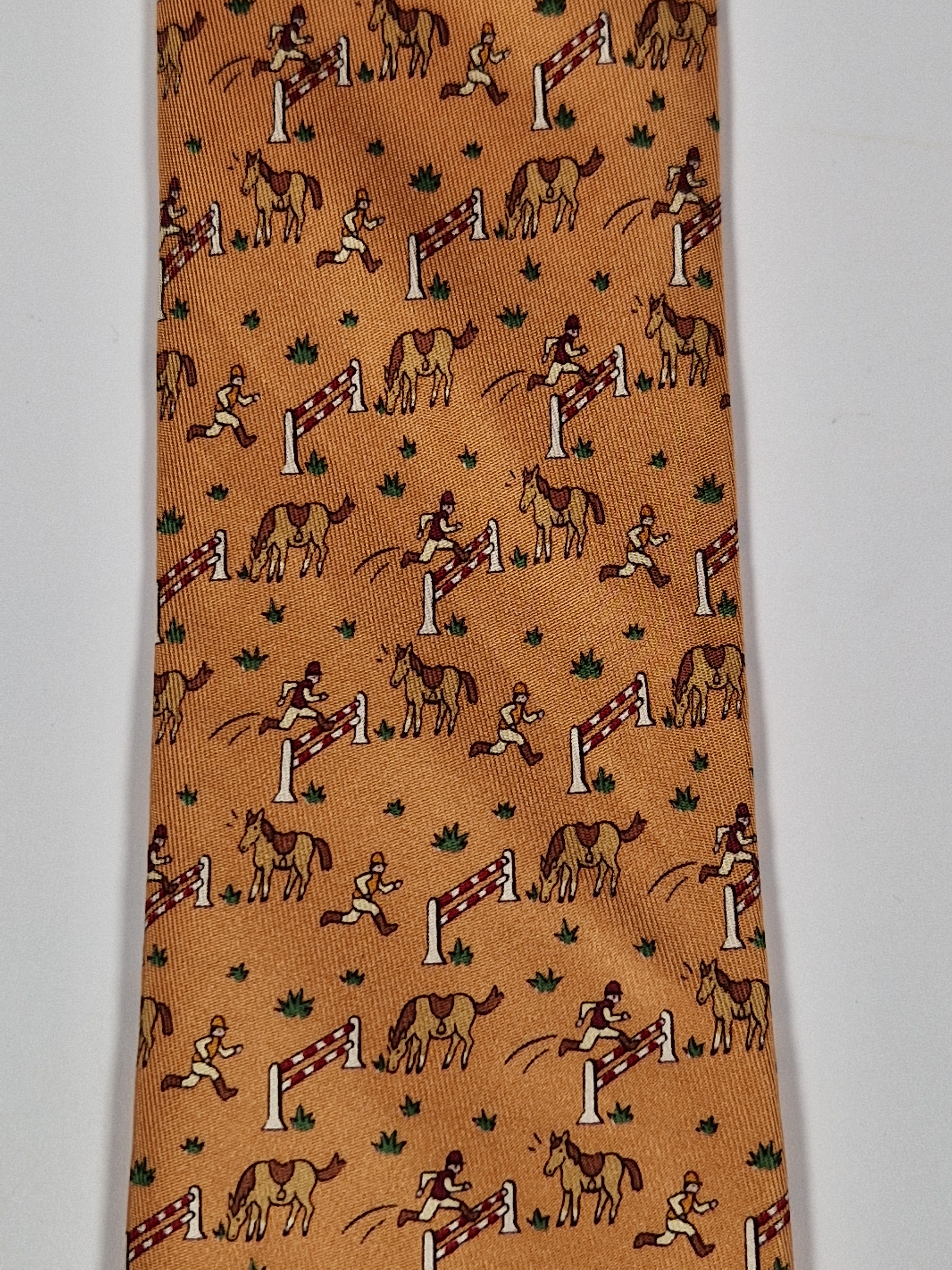Hermès silk tie orange whimsical equestrian pattern 5042 PA