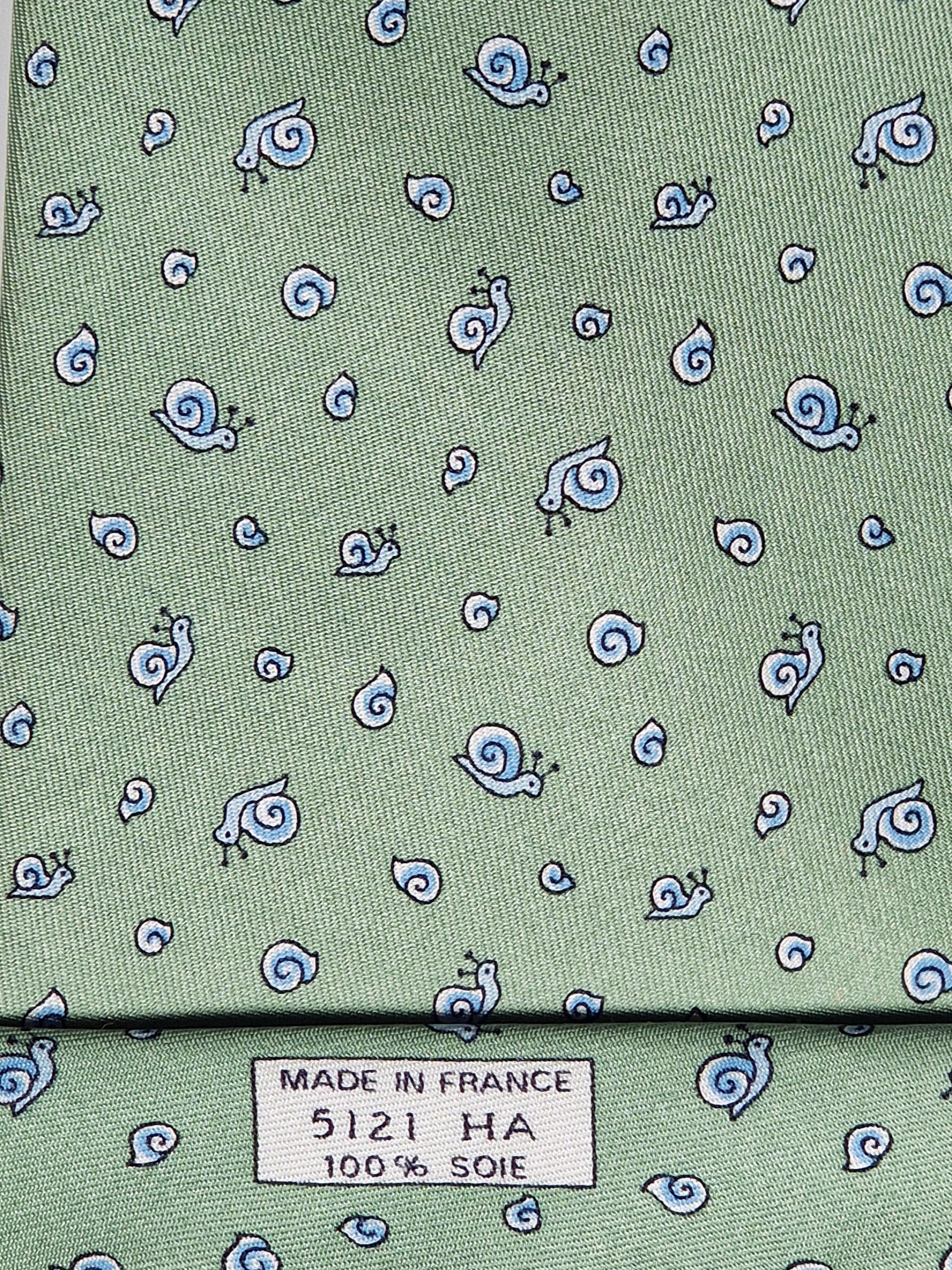Hermès silk tie green whimsical snail pattern 5121 HA
