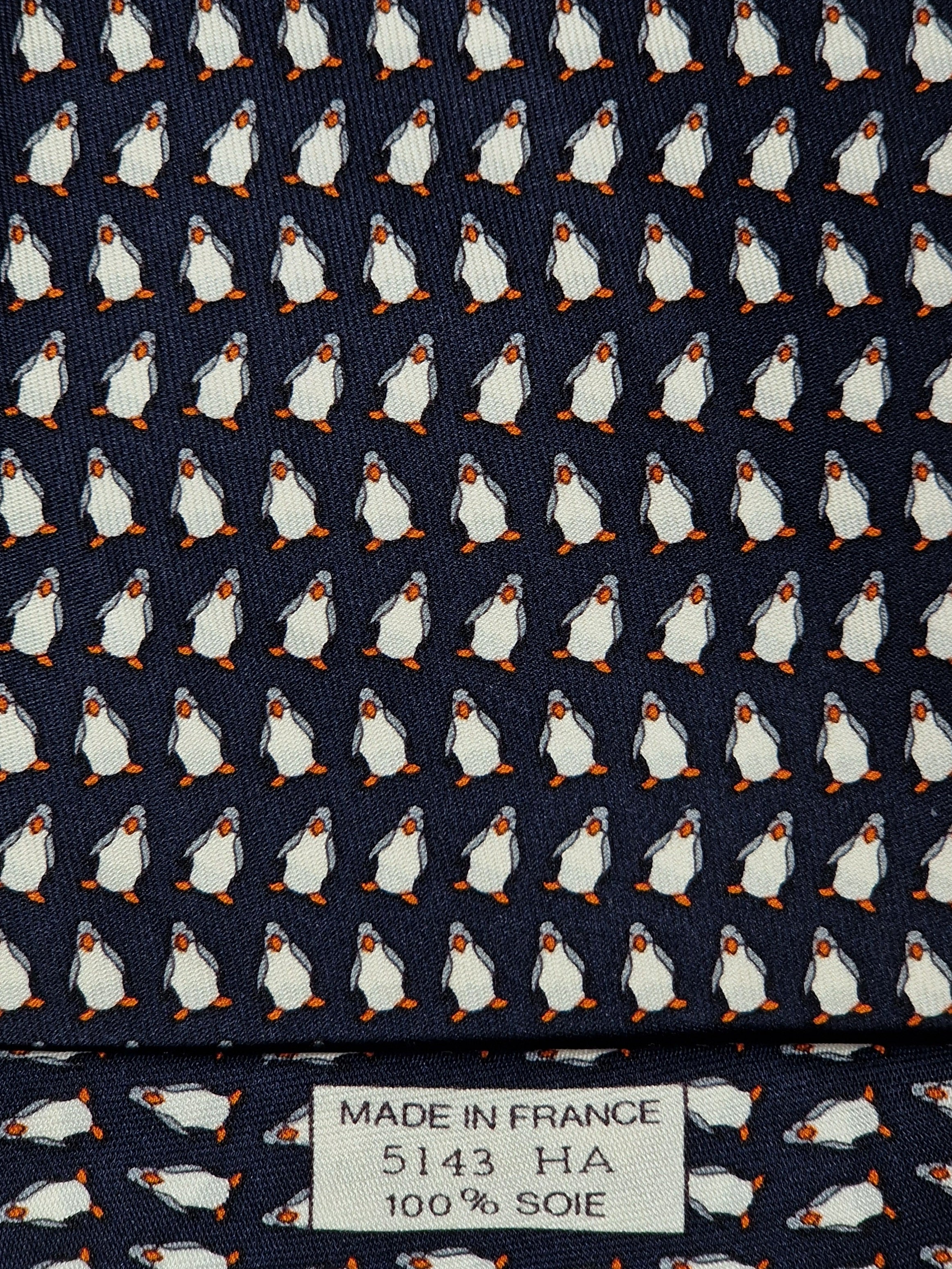 Hermès silk tie black whimsical pinguin pattern 5143 HA