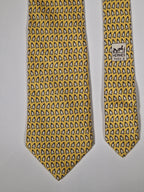 Hermès silk tie yellow whimsical pinguins pattern 5143 HA