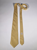 Hermès silk tie yellow whimsical pinguins pattern 5143 HA