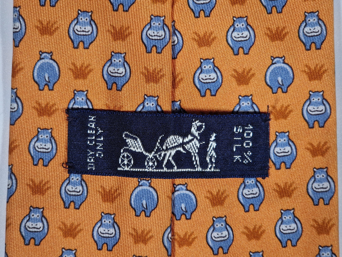 005195 Hermès tie Hippo orange 5195 IA
