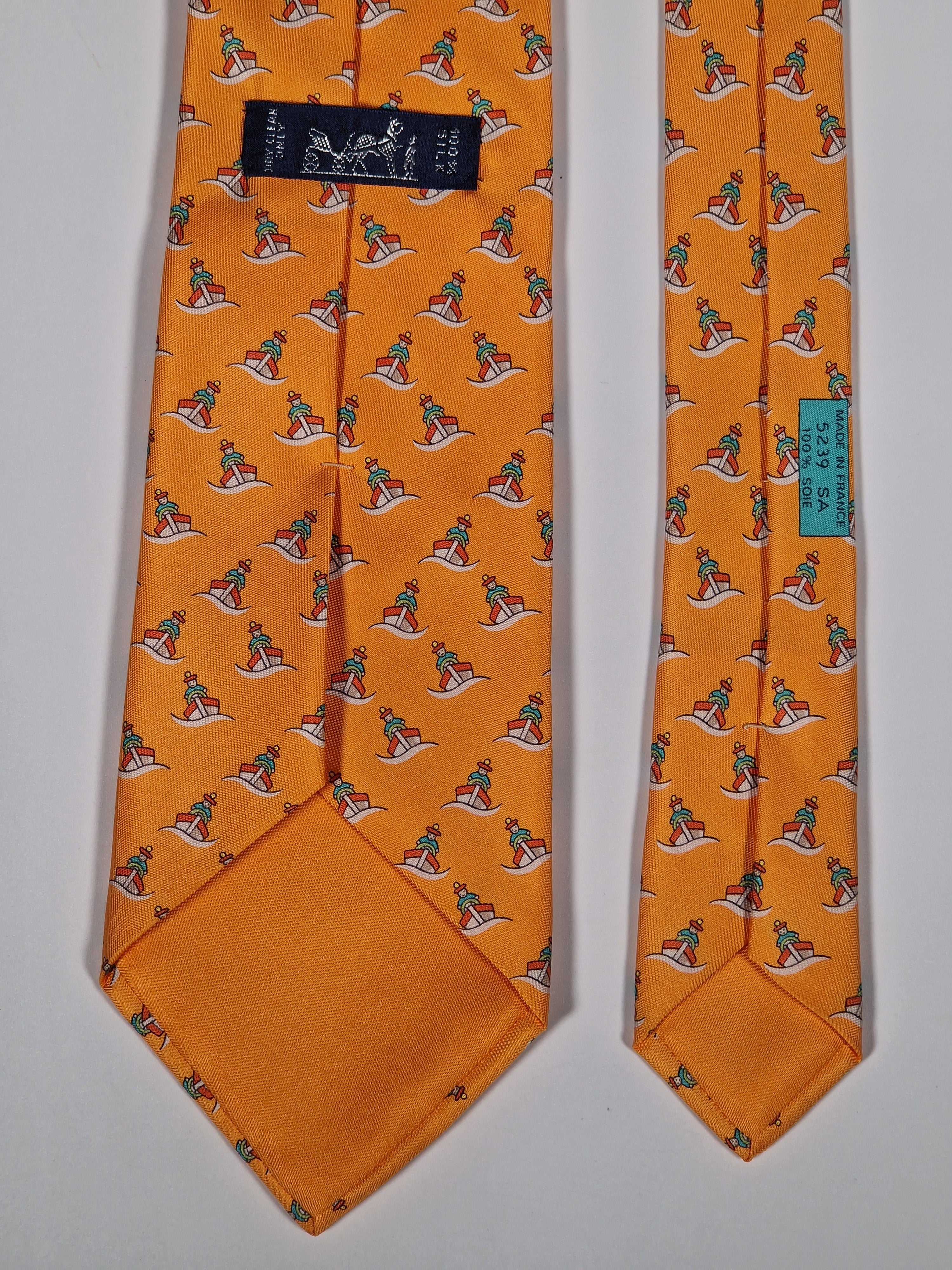 Hermès silk tie orange ship and sailor whimsical pattern 5239 SA