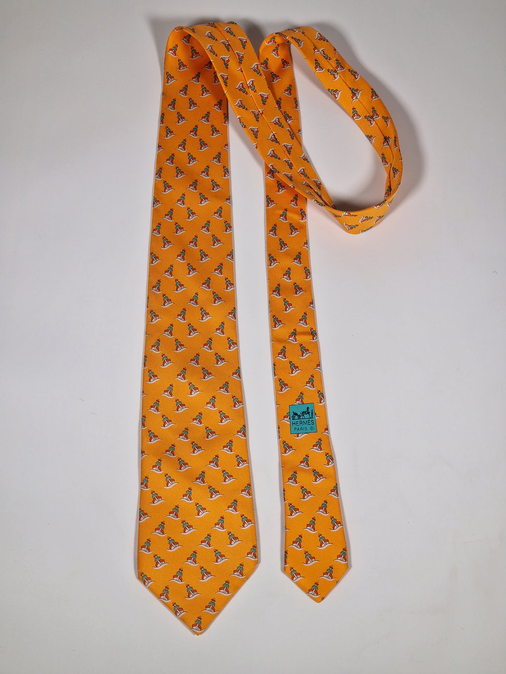 005239 Hermès tie orange whimsical seaman and boat 5239 SA