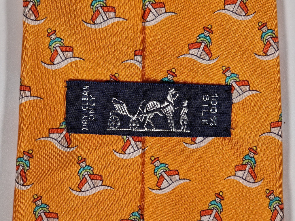 Hermès silk tie orange ship and sailor whimsical pattern 5239 SA