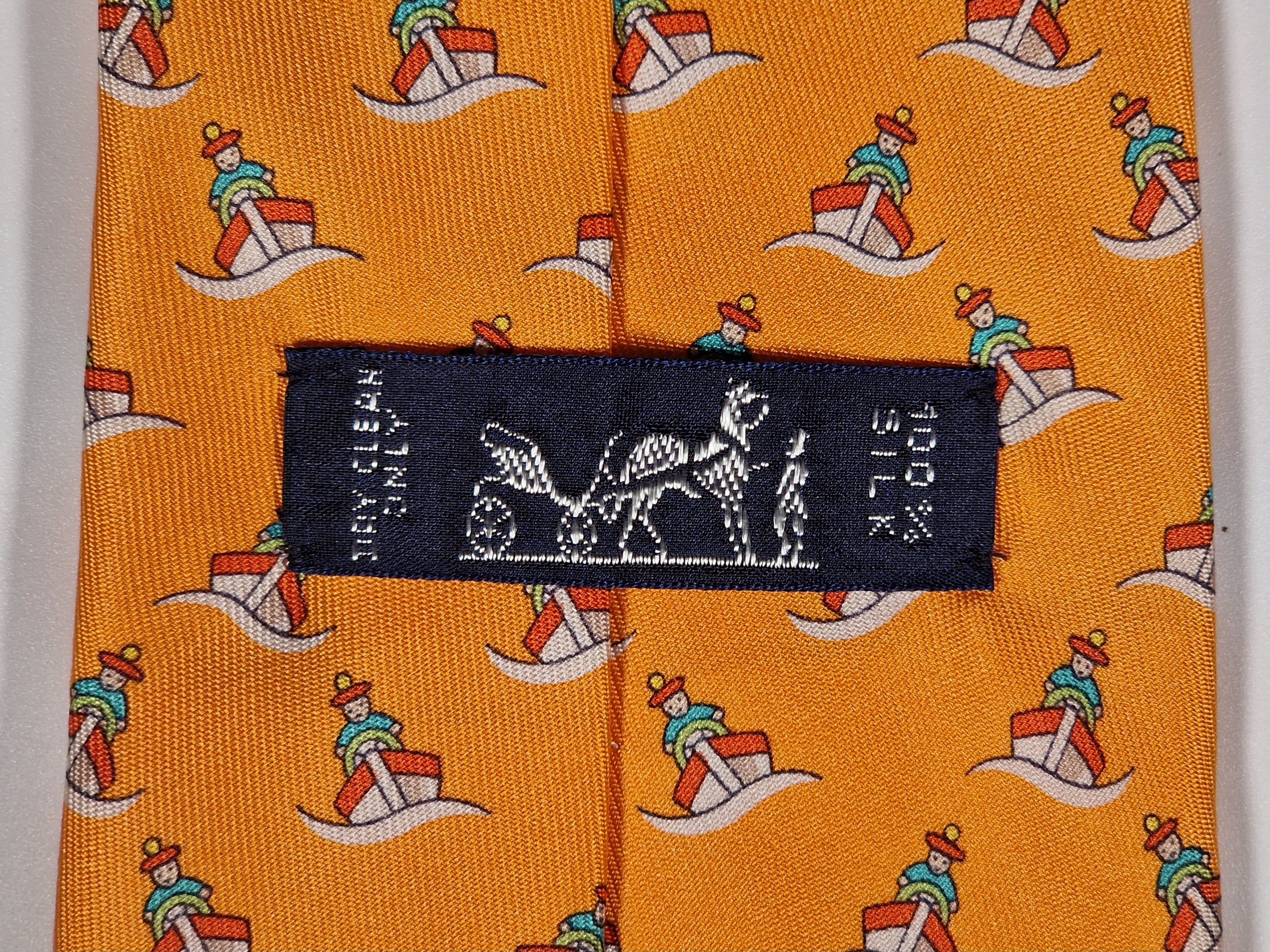 Hermès silk tie orange ship and sailor whimsical pattern 5239 SA