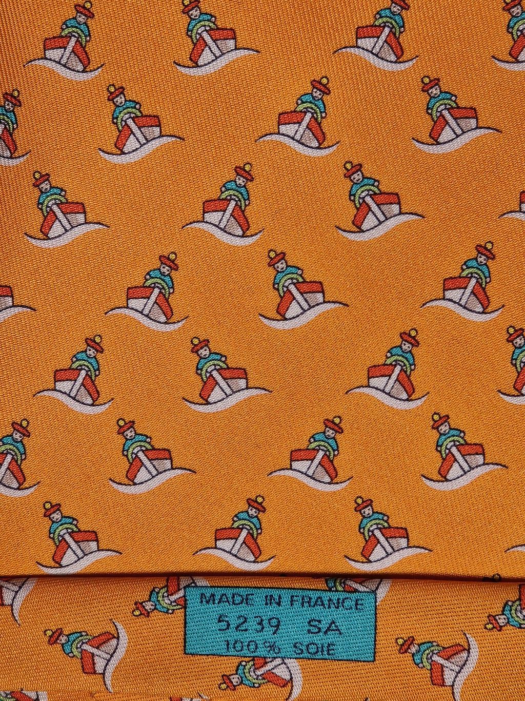 Hermès silk tie orange ship and sailor whimsical pattern 5239 SA