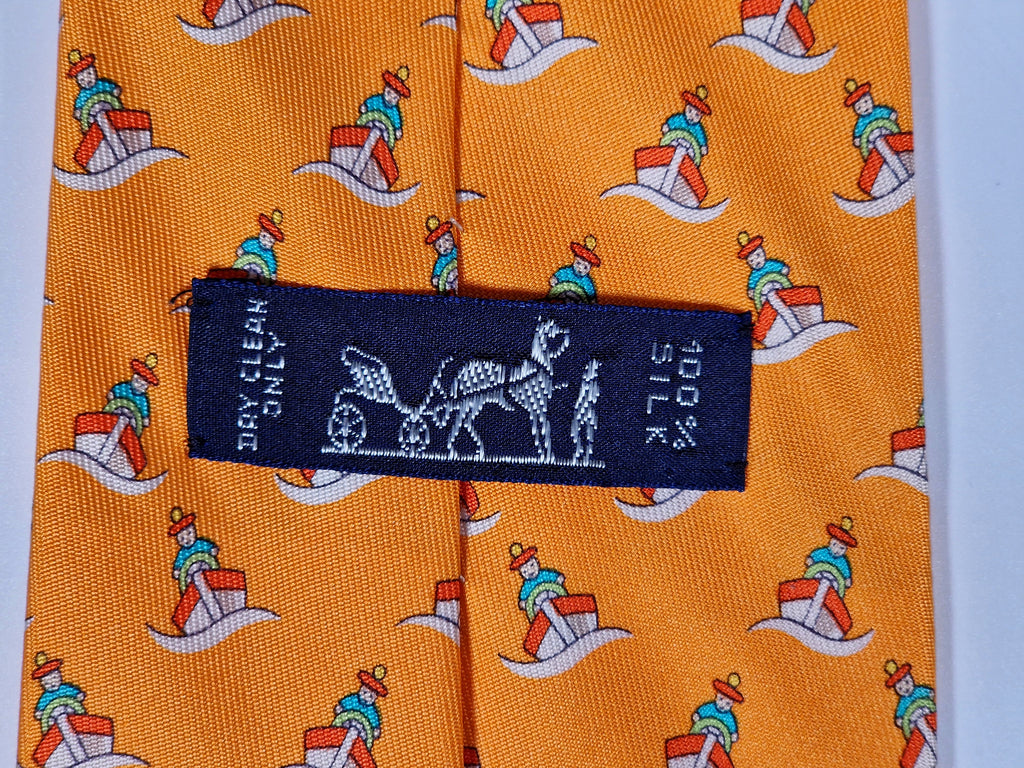 005239 Hermès tie orange whimsical seaman and boat 5239 SA