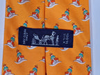 005239 Hermès tie orange whimsical seaman and boat 5239 SA