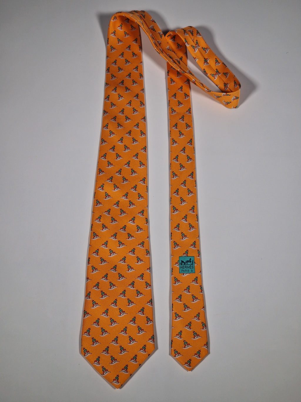 Hermès silk tie orange ship and sailor whimsical pattern 5239 SA