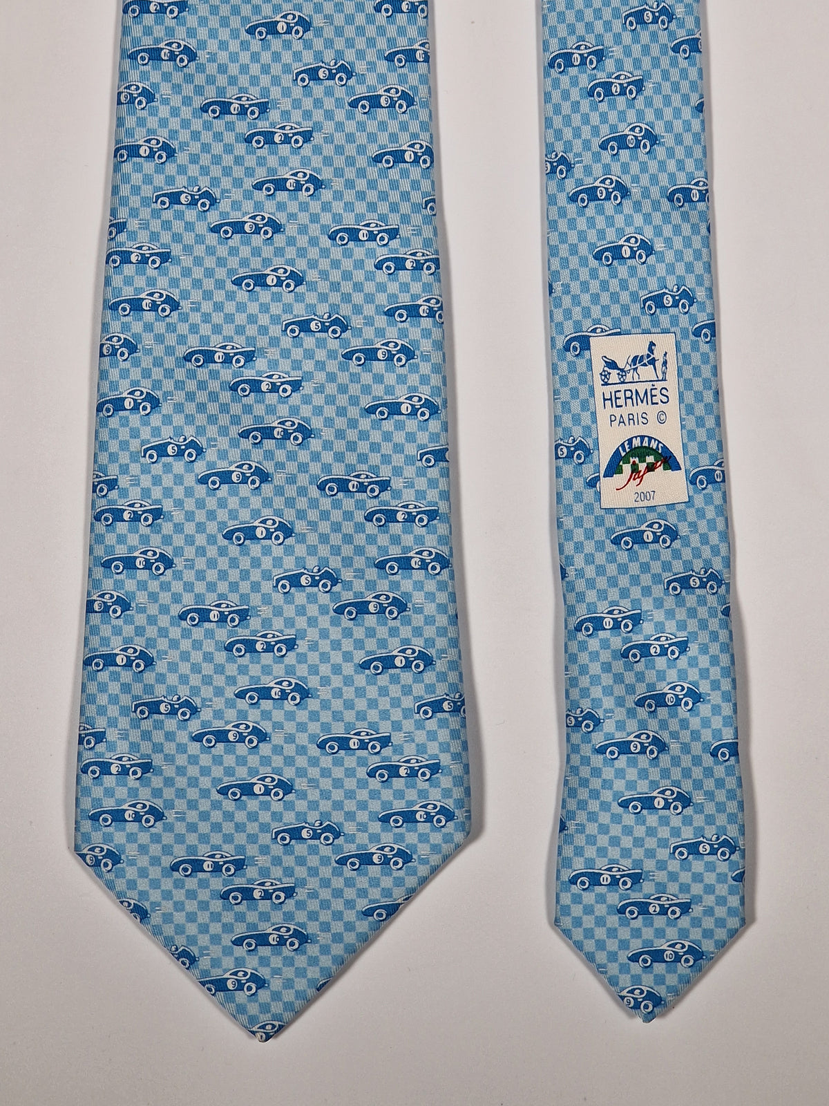 005259 Hermès tie light blue "Le Mans Classic" Hermès 5259 SA tie light blue