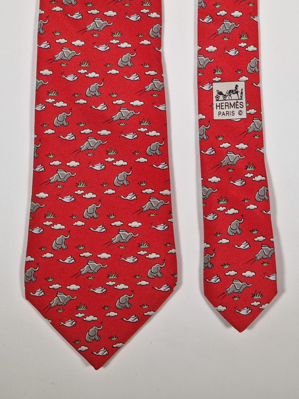 005268 Hermès tie red whimsical flying elephant 5268 SA
