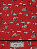 005268 Hermès tie red whimsical flying elephant 5268 SA