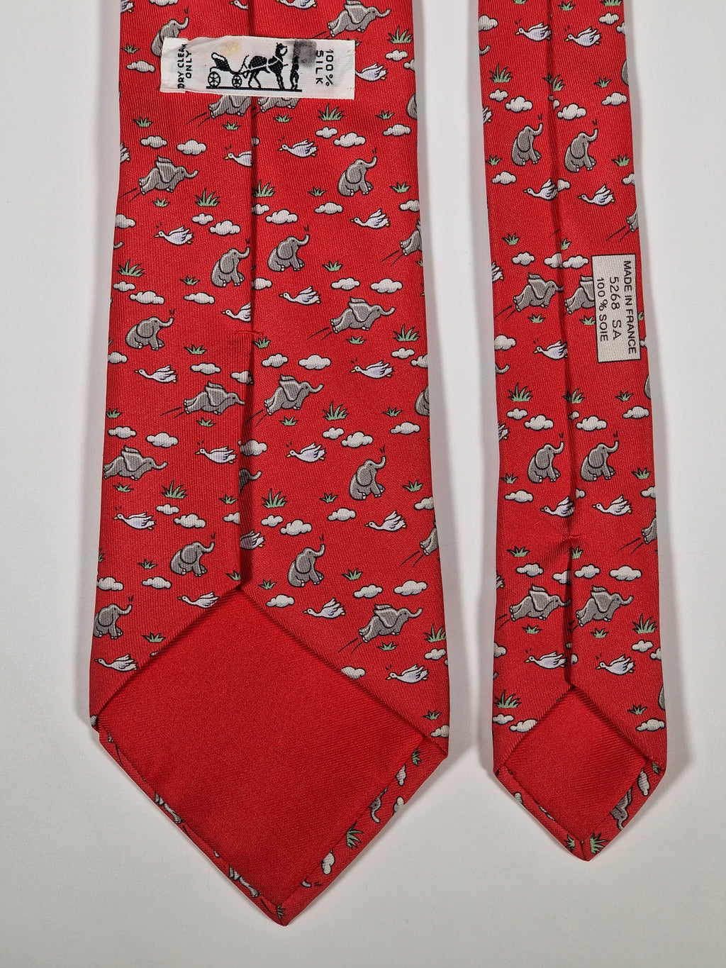 005268 Hermès tie red whimsical flying elephant 5268 SA
