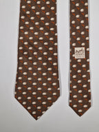 Hermès silk tie brown whimsical jumping sheep and H pattern 5273 SA