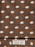 Hermès silk tie brown whimsical jumping sheep and H pattern 5273 SA