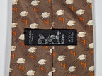 Hermès silk tie brown whimsical jumping sheep and H pattern 5273 SA