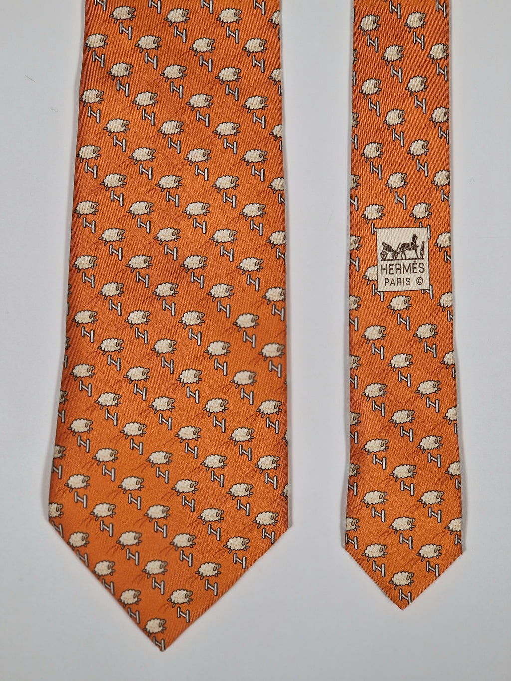005273 Hermès tie orange whimsical jumping sheep 5273 SA