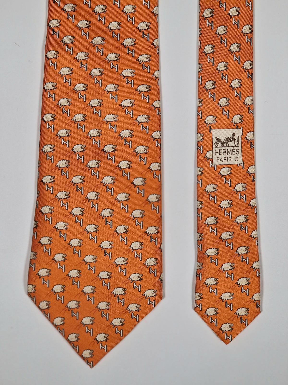 005273 Hermès tie orange whimsical jumping sheep 5273 SA