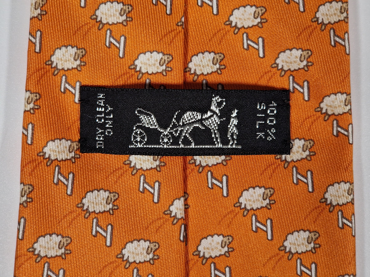 005273 Hermès tie orange whimsical jumping sheep 5273 SA