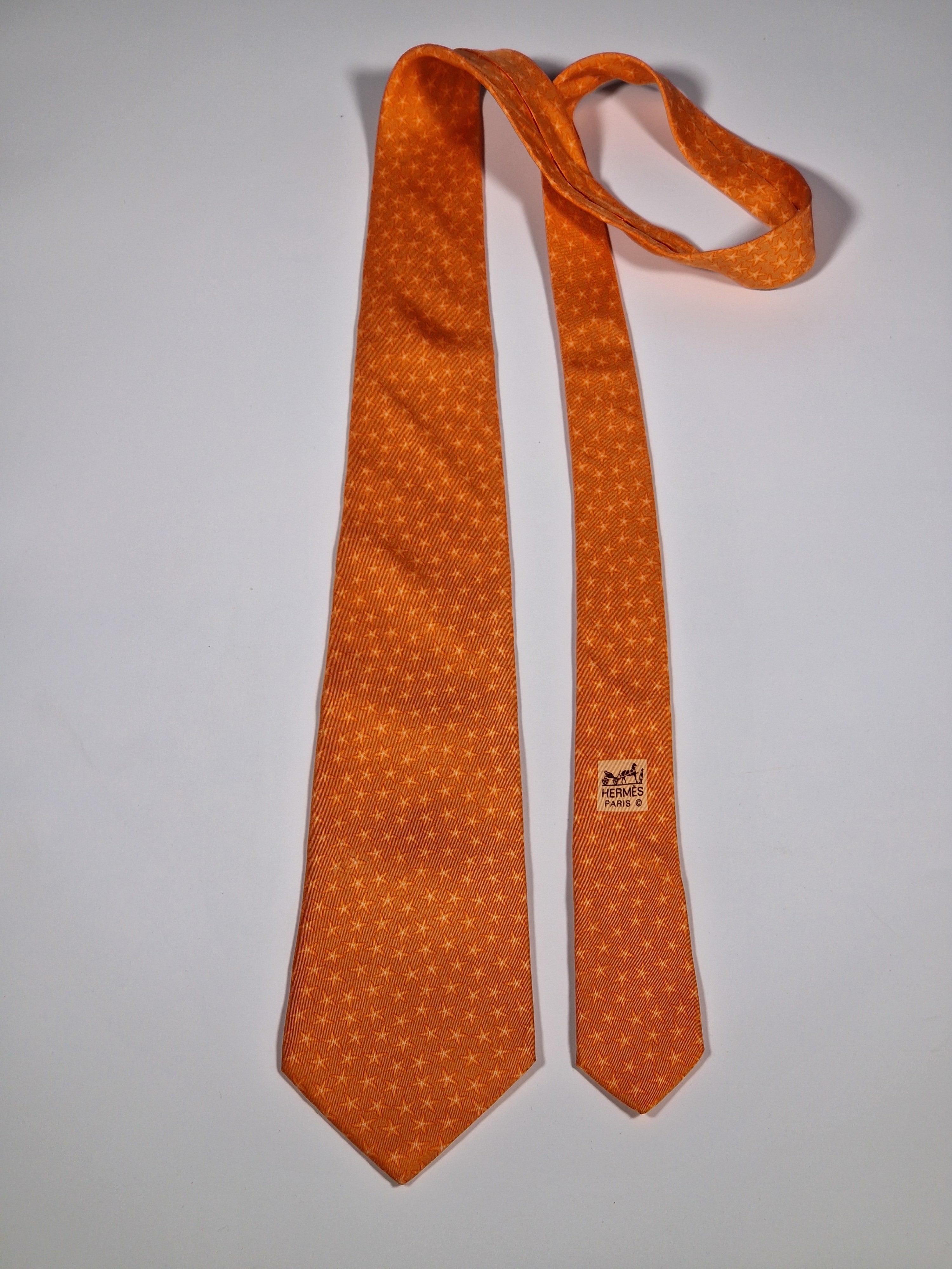 005302 Hermès silk tie orange star pattern 5302 TA