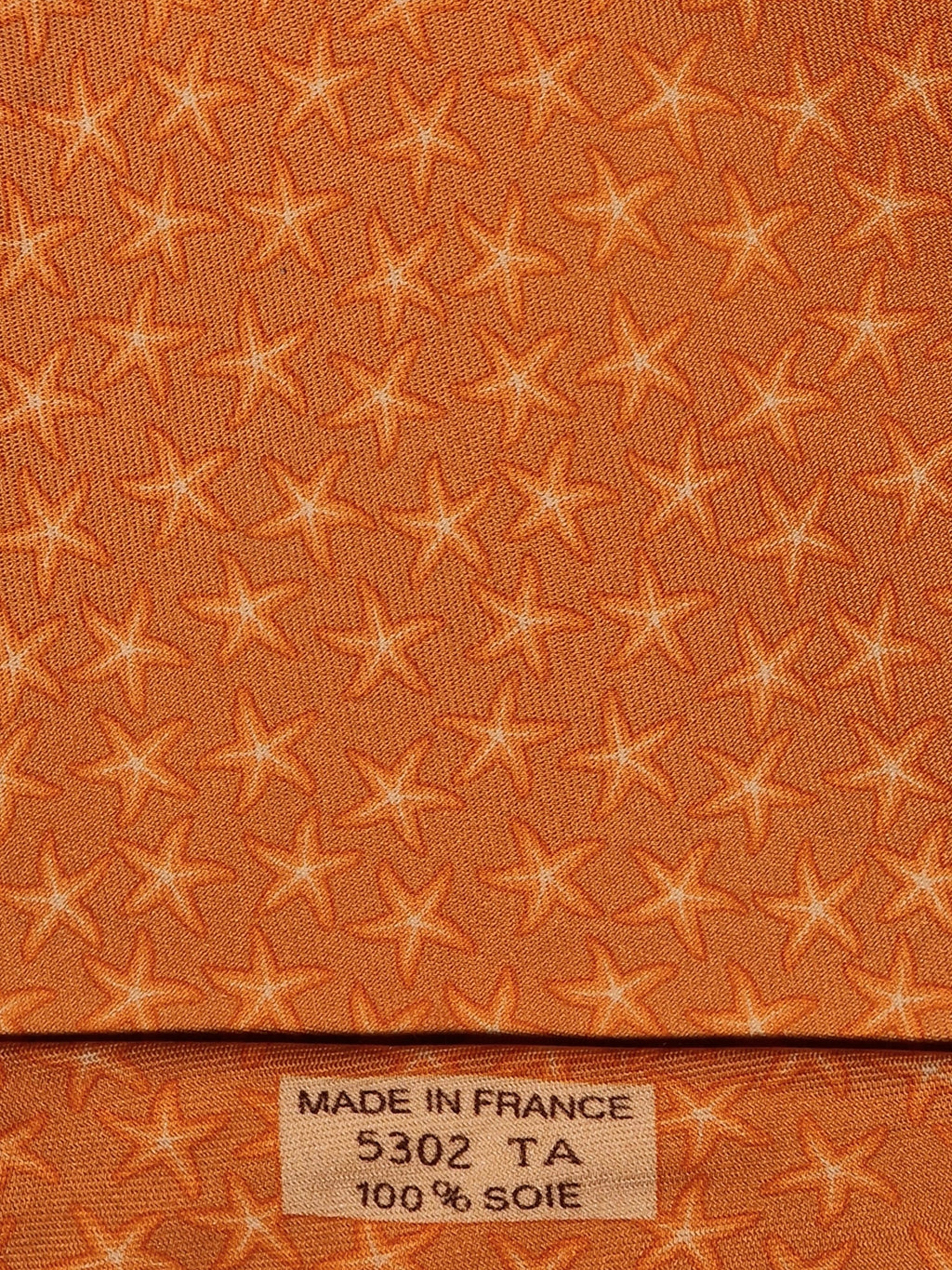 005302 Hermès silk tie orange star pattern 5302 TA