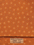 005302 Hermès silk tie orange star pattern 5302 TA