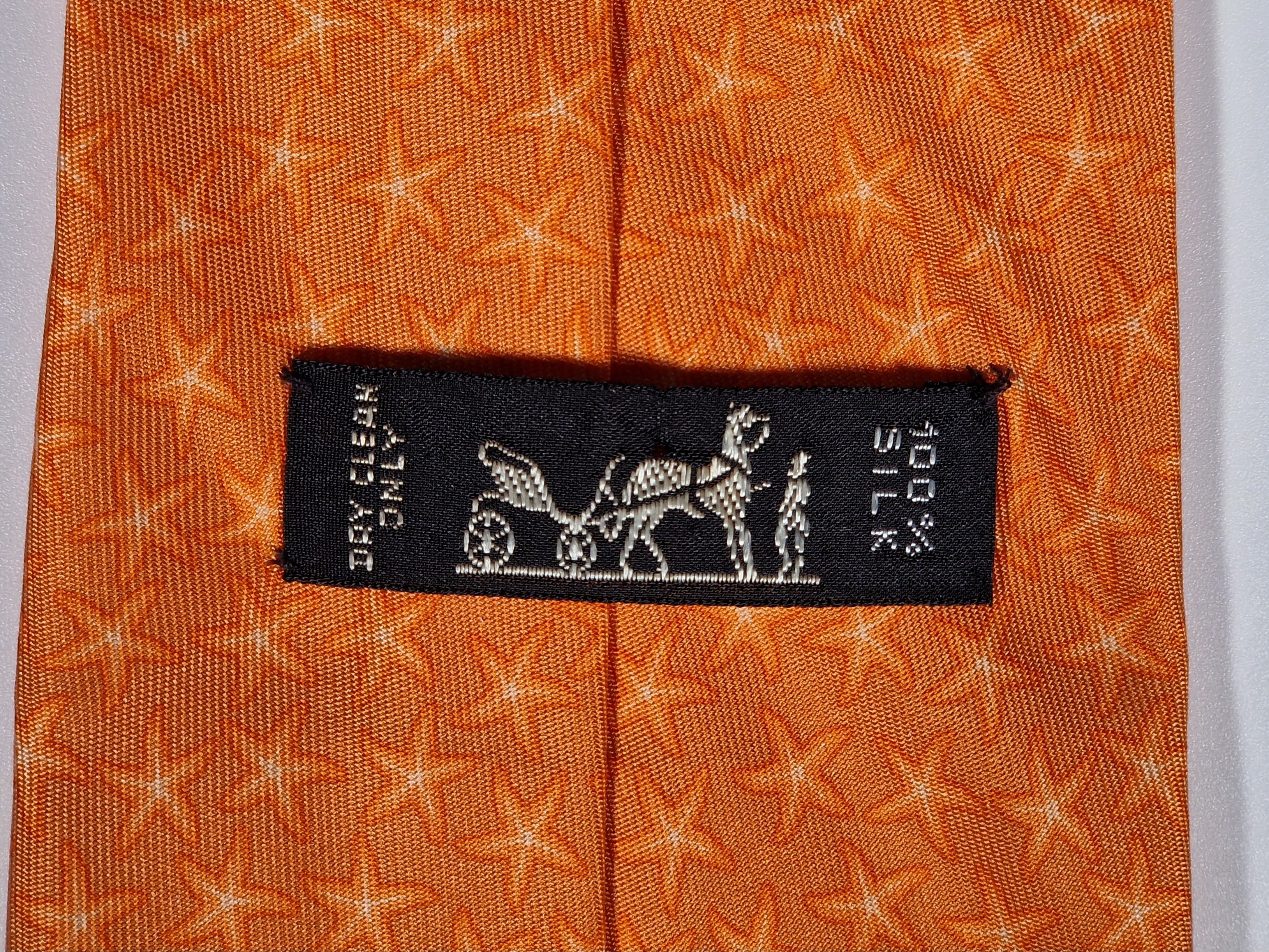 005302 Hermès silk tie orange star pattern 5302 TA
