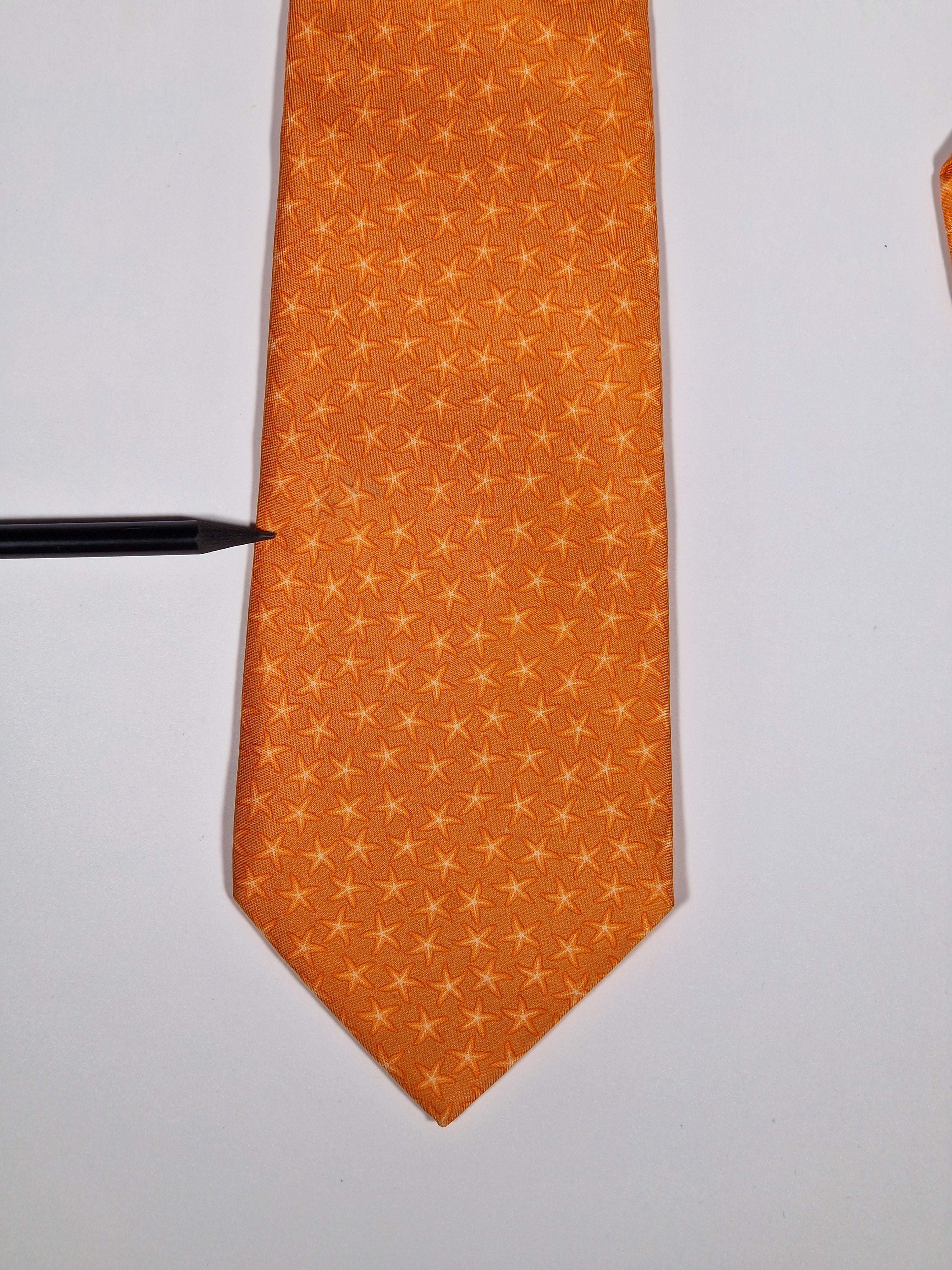 005302 Hermès silk tie orange star pattern 5302 TA