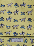 Hermès silk tie yellow horse, jockey and rocking horse 5313 TA