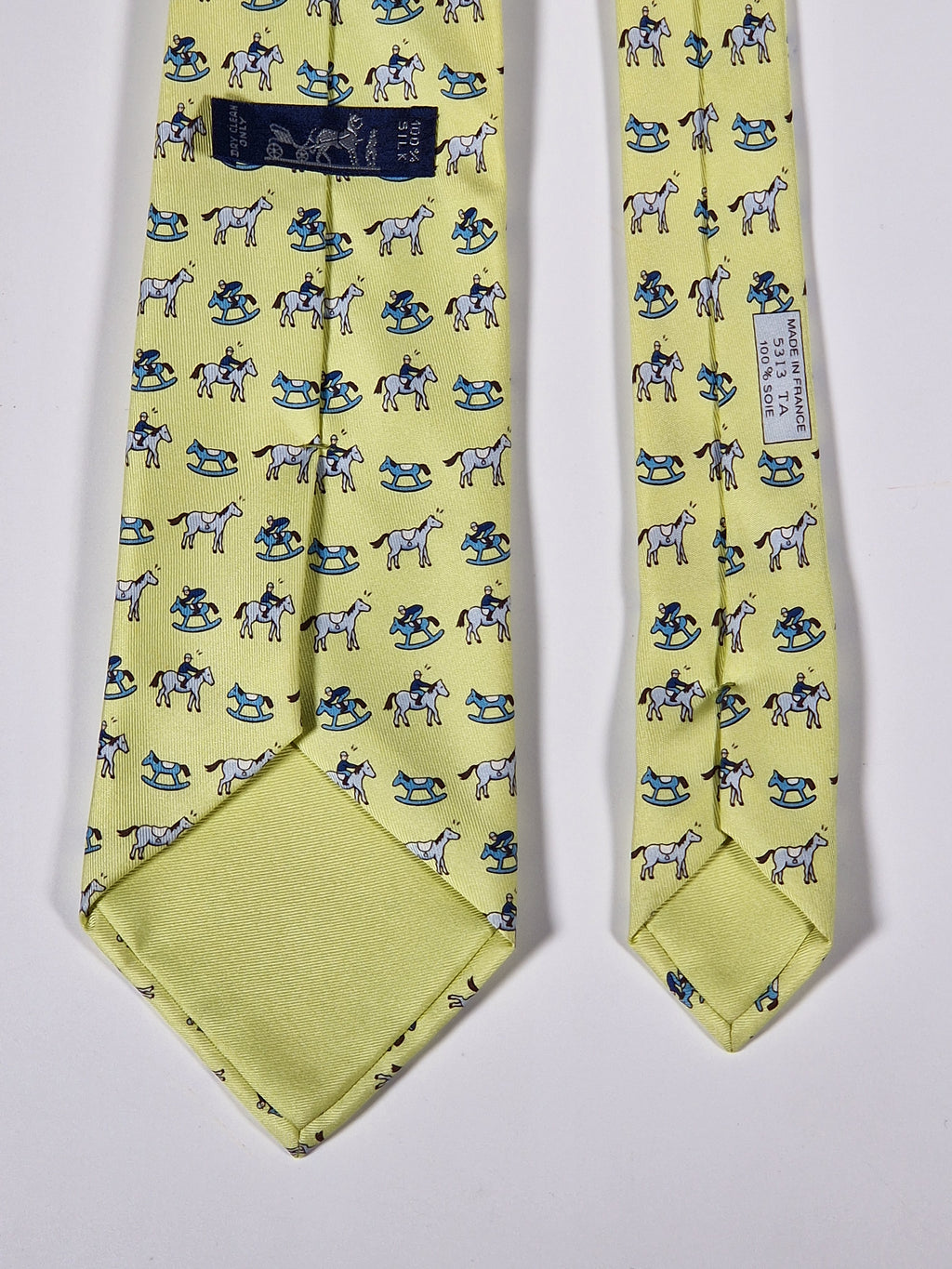 Hermès silk tie yellow horse, jockey and rocking horse 5313 TA